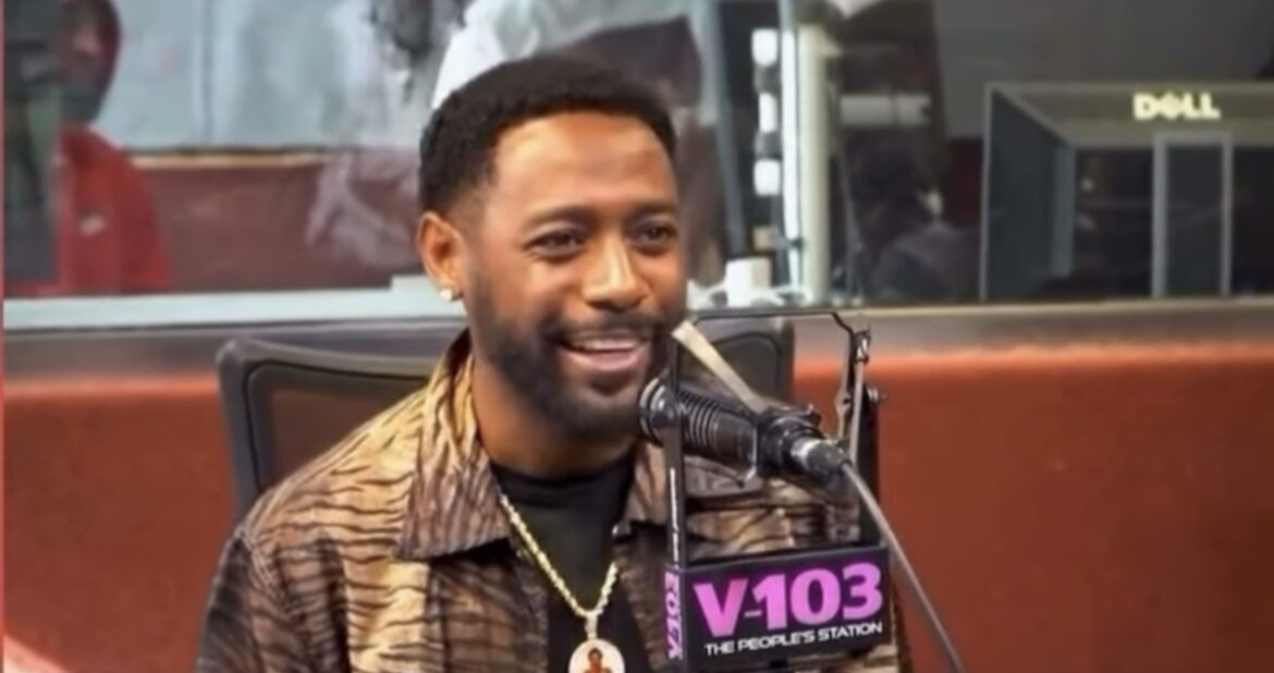 Comedian Kountry Wayne Explains Why He Freely Gives Money to Women - Even Hands Cash to Radio Host Mid-Interview