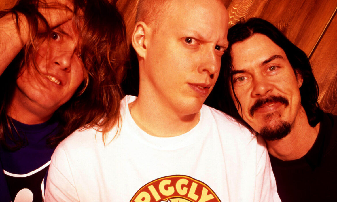 Butthole Surfers, August 1996: (L-R) Guitarist Paul Leary, drummer King Coffey, and lead vocalist/keyboards Gibby Haynes of the American rock band the Butthole Surfers in New York, New York. (Credit: Bob Berg/Getty Images)