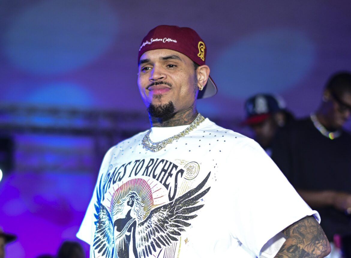 Chris Brown & His Dad Melt Fans Hearts With Rare Backstage Moment At 'Breezy Bowl' Tour