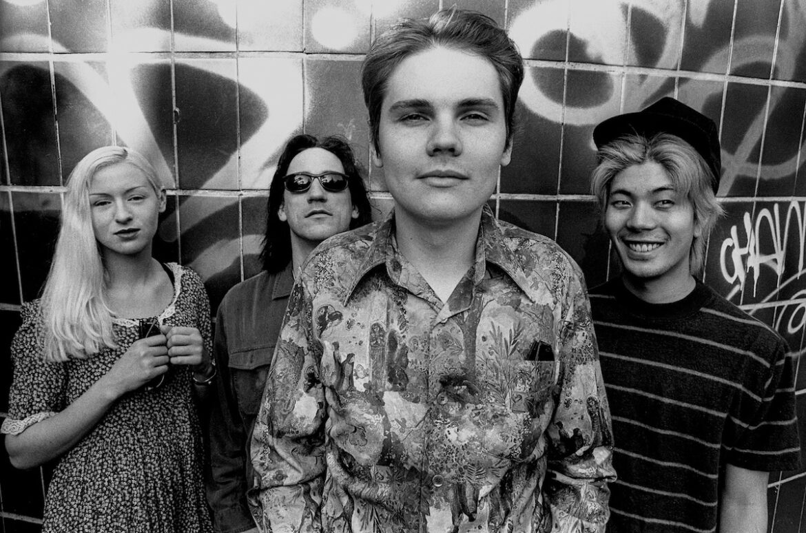 D'Arcy Wretzky (bass), Jimmy Chamberlin (drums), Billy Corgan (leadsinger and guitar), and James Iha (guitar) of the Smashing Pumpkins in 1993. (Credit: Paul Bergen/Redferns)