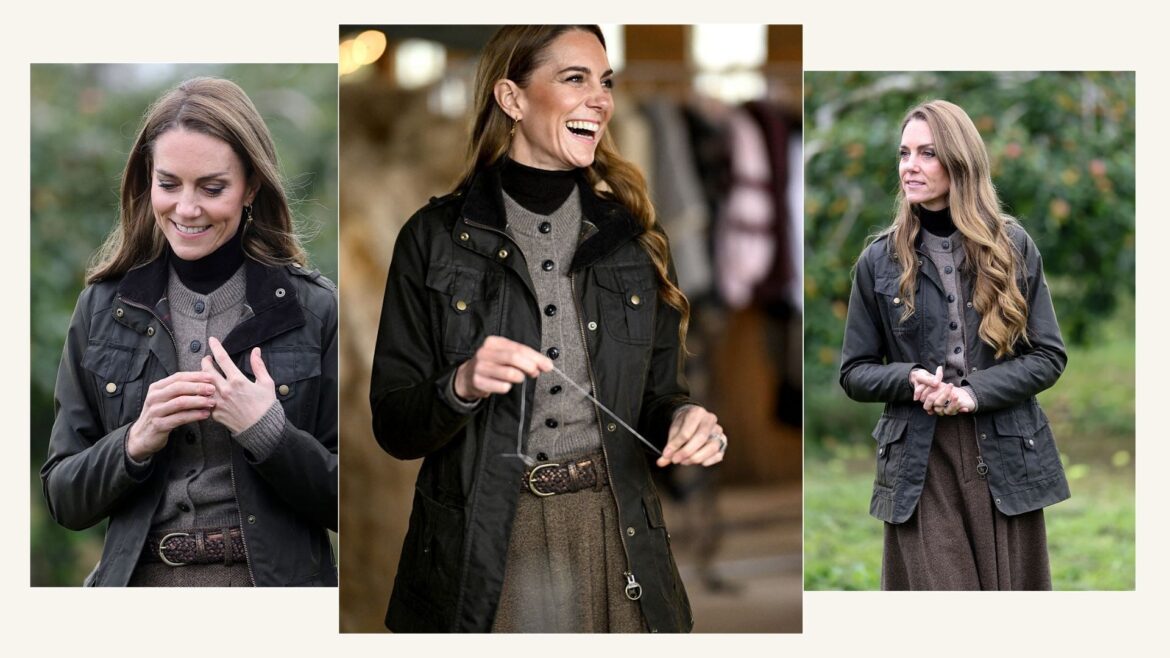 Kate Middleton wearing a grey knit, grey skirt and Barbour jacket