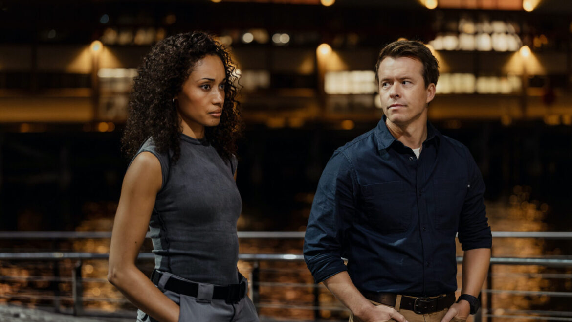 Olivia Swann as NCIS Special Agent Captain Michelle Mackey and Todd Lasance as AFP Liaison Officer Sergeant Jim 